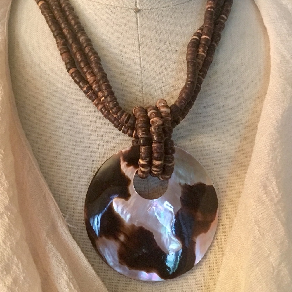 Multi strand wooden beads w/abalone shell pendant